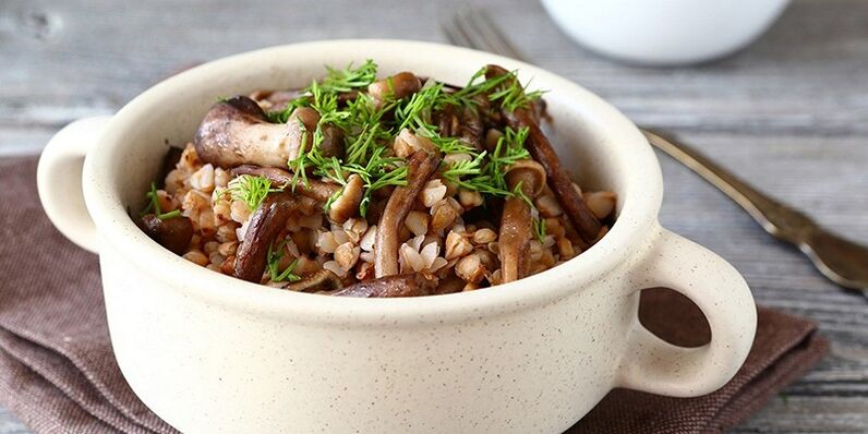 Buckwheat porridge with mushrooms for lunch on the menu of healthy food